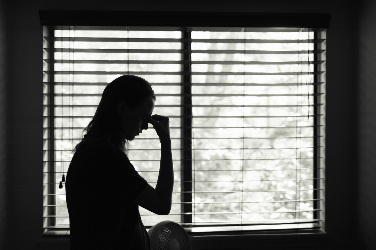 Woman experiencing domestic violence during the COVID-19 pandemic.