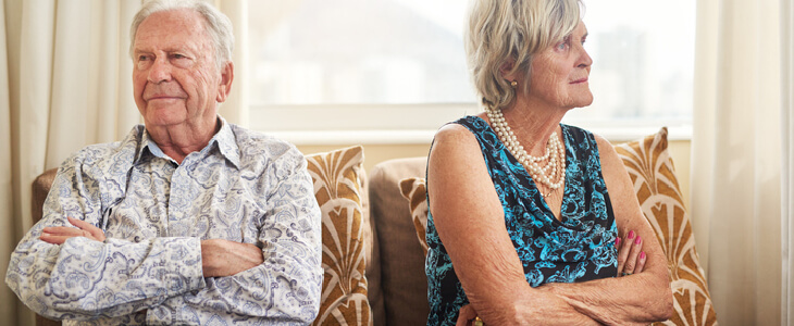 Elderly couple in visible resentment with one another
