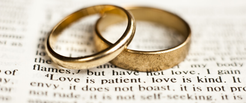 Covenant marriage wedding bands on a Bible