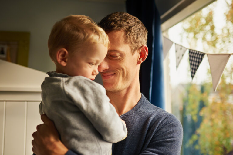 Shot of an adorable little boy spending some quality time with his father at home